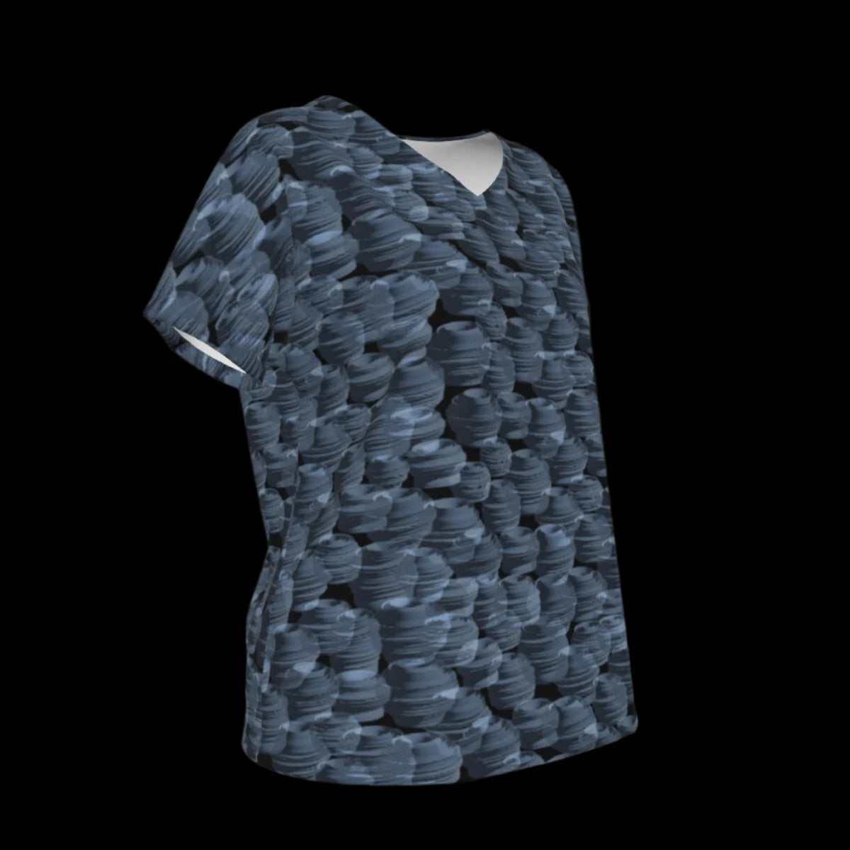 Right side of blue patterned shirt on a black background