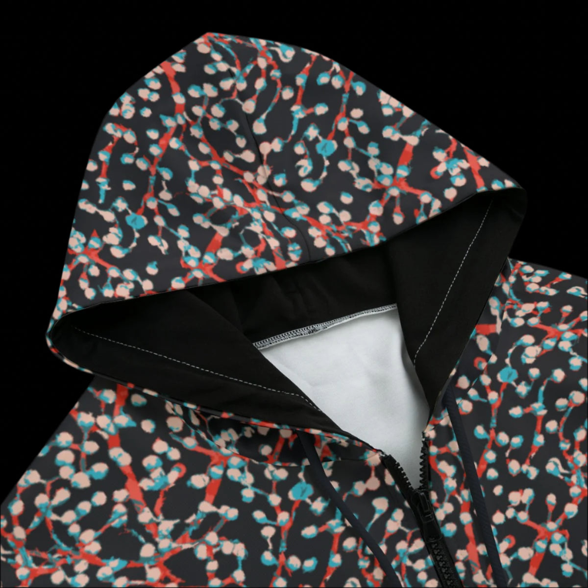 Front top of Hoodie with a colorful abstract pattern on a black background