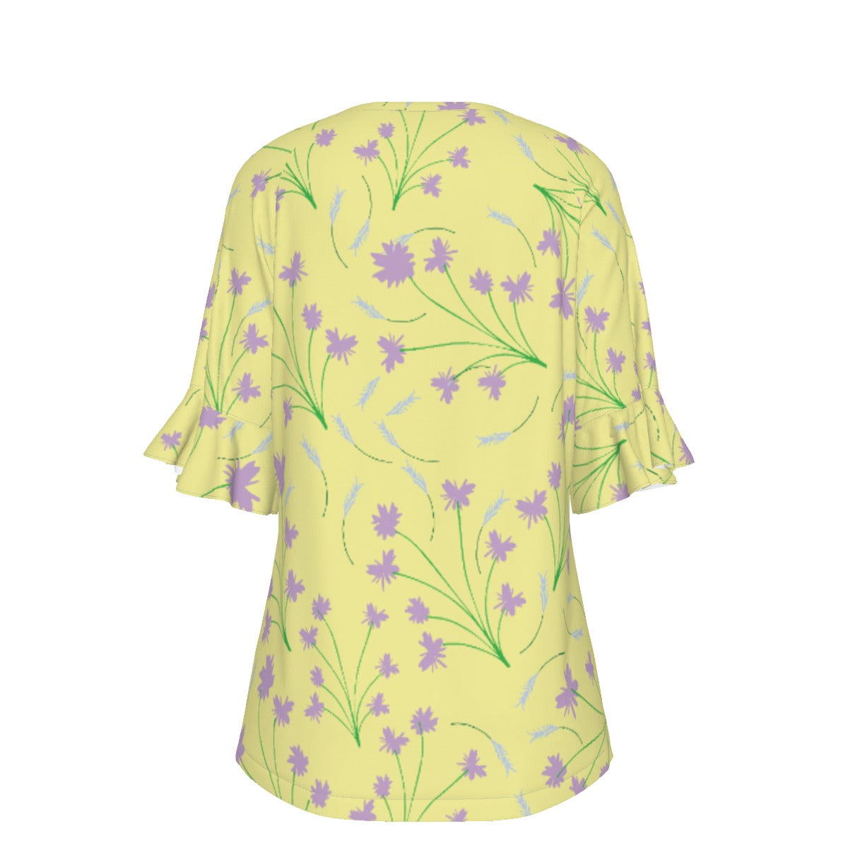 Back of yellow blouse with floral pattern on a black background