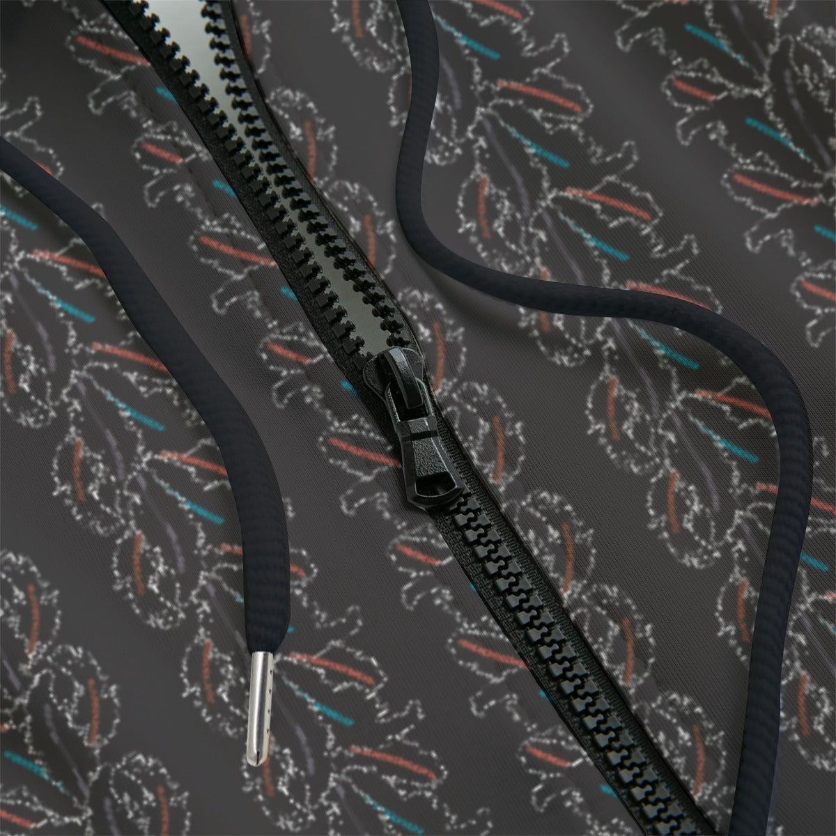 Close-up of a dark patterned zipper hoodie on a background