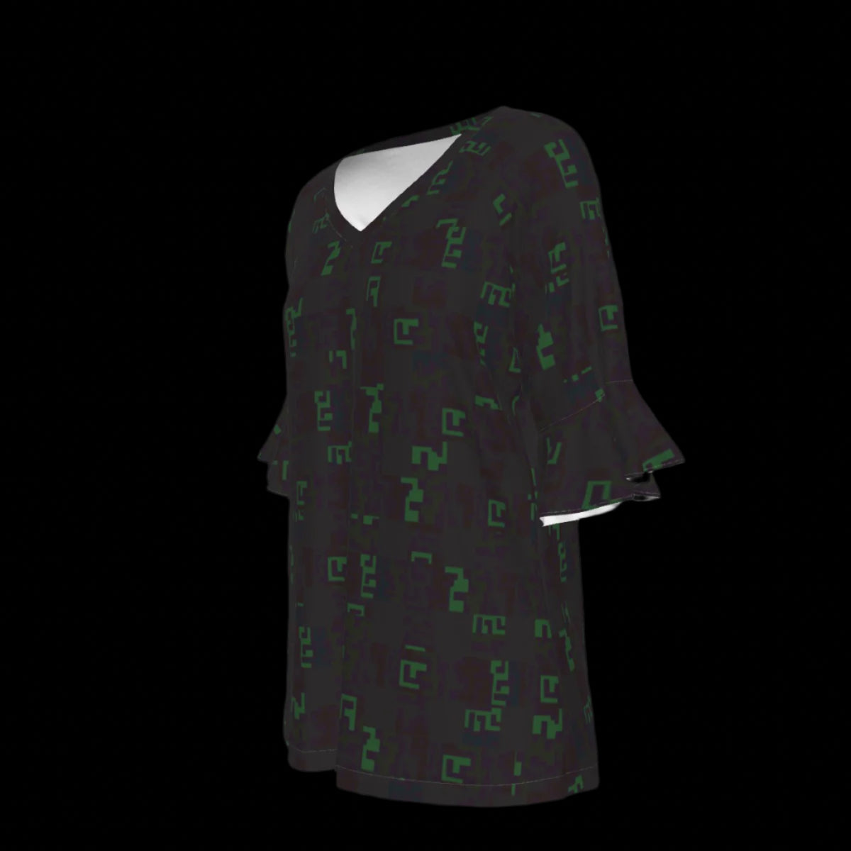 Left of black blouse with green geometric pattern on a black background