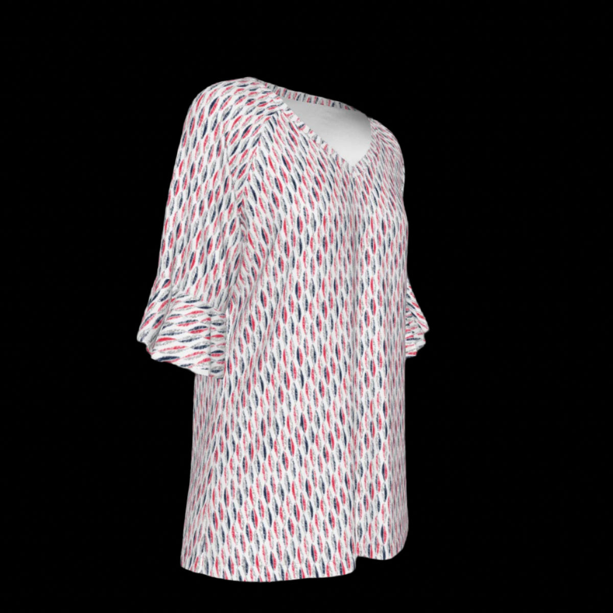 Right side of a patterned blouse with ruffled sleeves on a black background