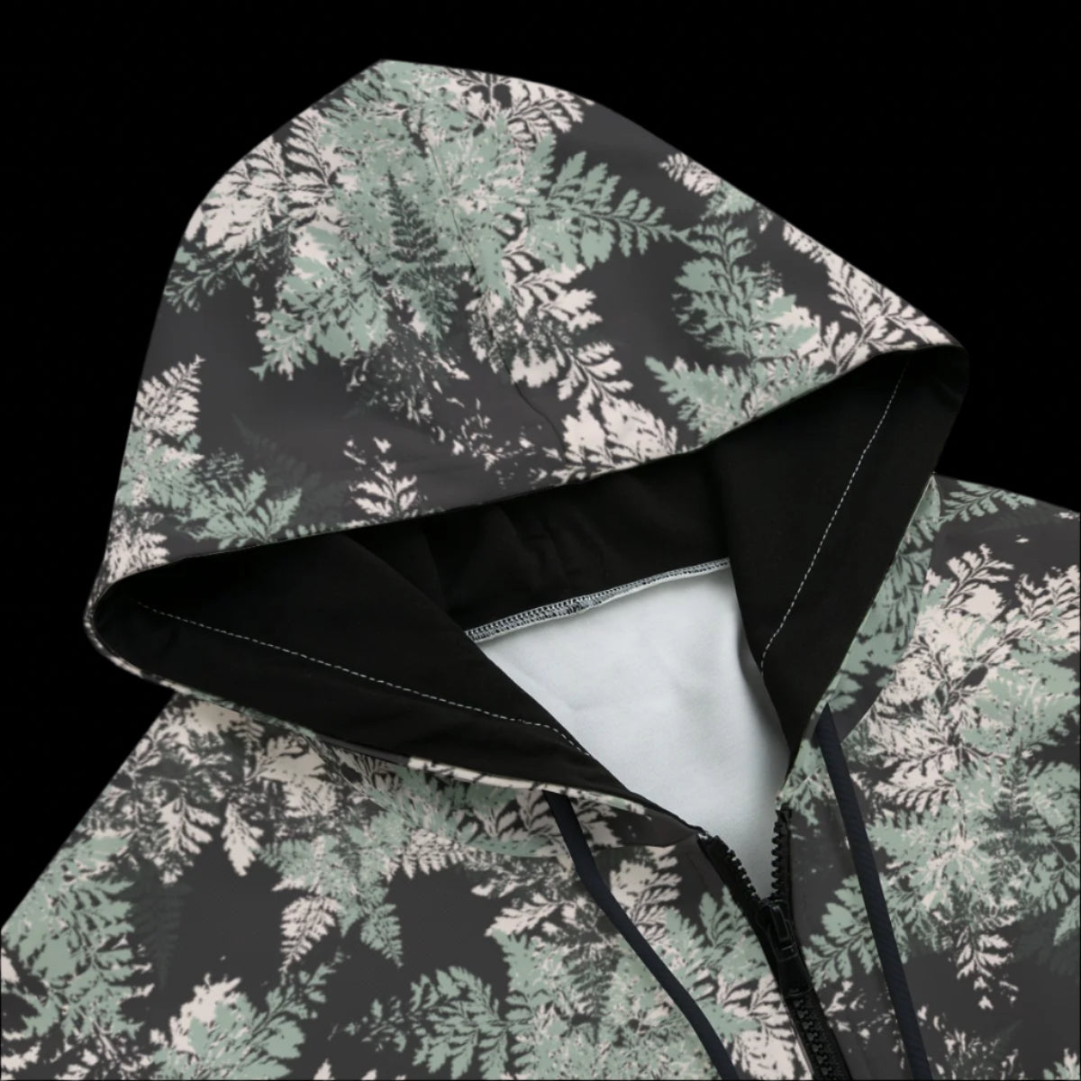 Front top of hoodie with floral pattern on a black background