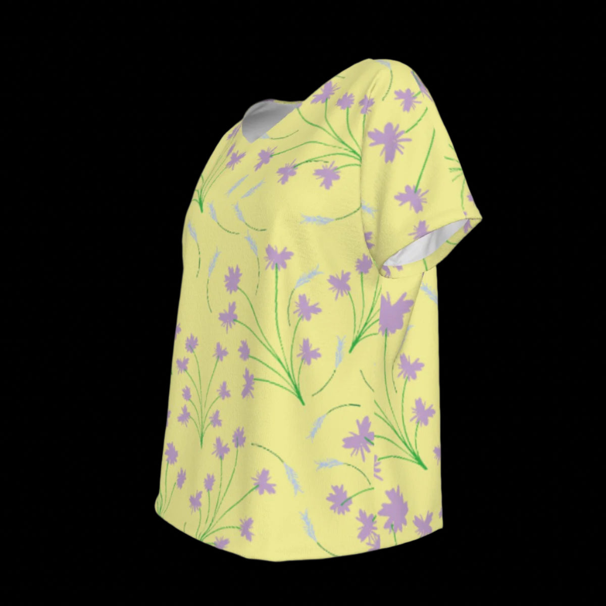 Left side of yellow V-Neck t-shirt with purple floral pattern on a black background