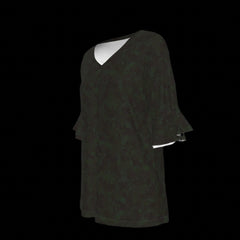 Left side of dark green blouse on a black background