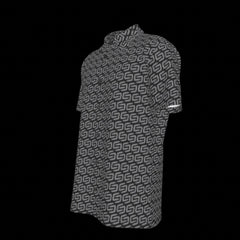 Left side of a button down short-sleeve shirt with geometric pattern on a black background