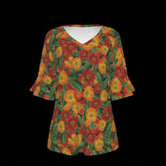 Front of floral patterned top with red, orange, and green colors on a black background