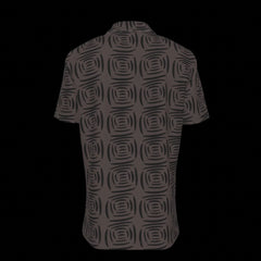 Back of black patterned button-down shirt on a black background