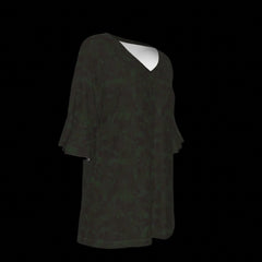 Right side of dark green blouse on a black background