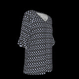 Right side of black and light blue patterned blouse on a white background
