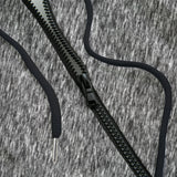 Close-up of a black zippered hoodie