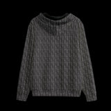 Back of black patterned hoodie on a black background