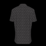 Back of a black patterned button down short sleeve shirt on a black background