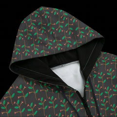 Front top of hoodie with a dark leaf pattern on a black background