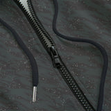 Close-up of a textured gray black zipper hoodie