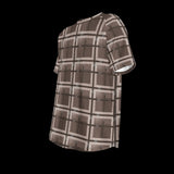 Left side of plaid shirt with brown and beige pattern on a black background