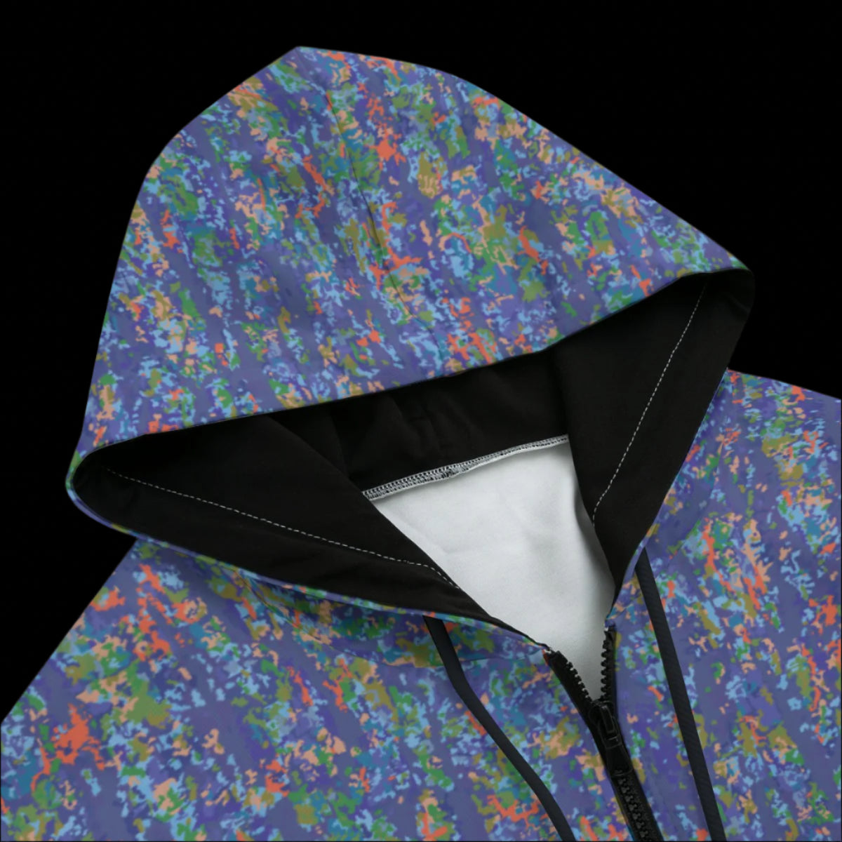 Top front of a Colorful camouflage-patterned hoodie on a black background