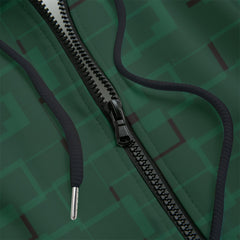 Front detail of green patterned hoodie on a black background