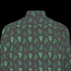 Top back of green and black patterned long sleeve shirt on a black background