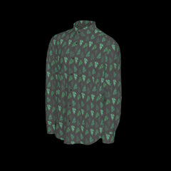 Left side of green and black patterned long sleeve shirt on a black background