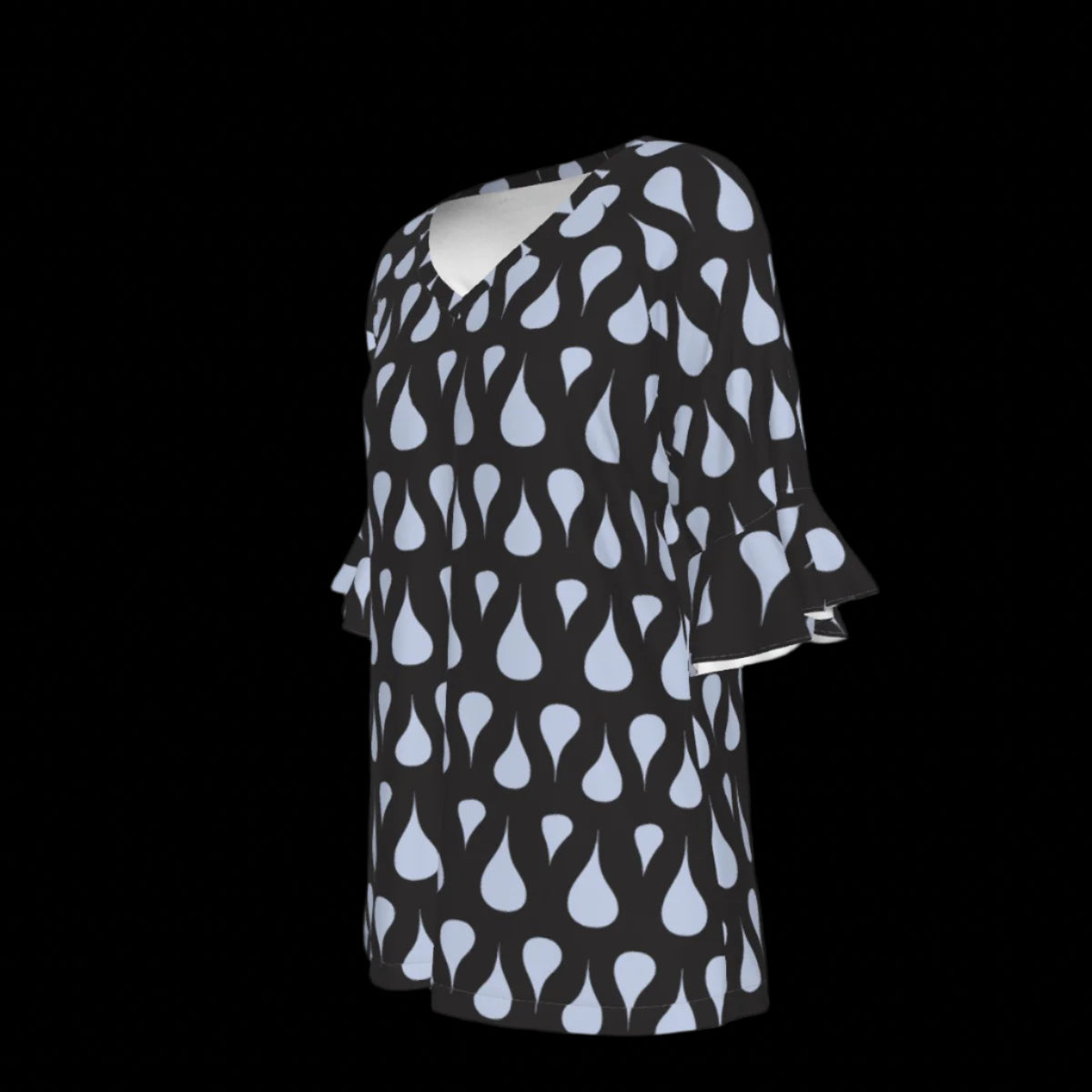 Left of green leaf patterned blouse on a black background