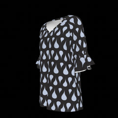 Left of green leaf patterned blouse on a black background