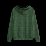 Back of a green patterned hoodie on a black background