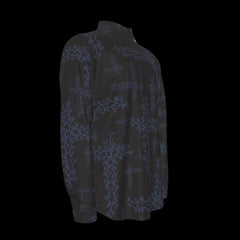 Right side of black shirt with blue floral pattern on a black background