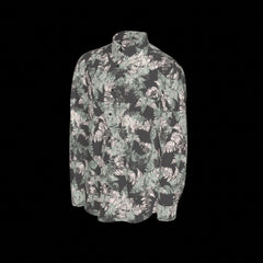 Left side of floral patterned shirt on a black background
