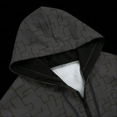 Front top of a black patterned hoodie on a black background