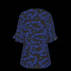 Back of black blouse with blue floral pattern on a black background