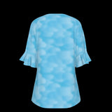 Back of light blue blouse on a Black background