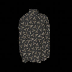 Right side of a patterned long sleeve shirt on a black background