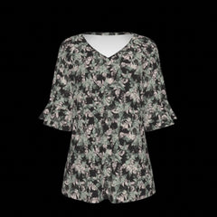 Front of a blouse with fern design on a black background