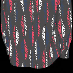 Bottom back hem of black shirt with red and white pattern on a black background