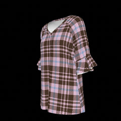 Left side of plaid patterned blouse with ruffled sleeves on a black background