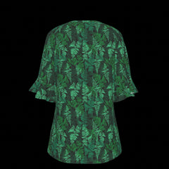 Back of green leaf-patterned blouse on a black background