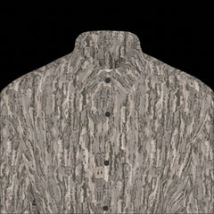 Top front of a textured long sleeve shirt on a black background