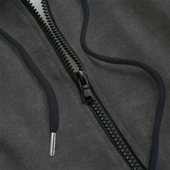 Close-up of a black and grey zipper hoodie