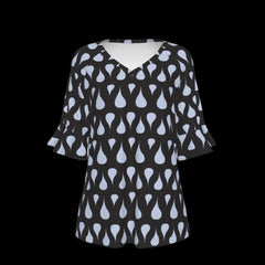 Front of black blouse with light blue pattern on a black background
