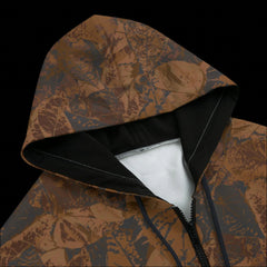 Front top of a black zipper camouflage-patterned hoodie on a black background