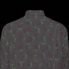 Top back of a dark patterned long sleeve shirt on a black background