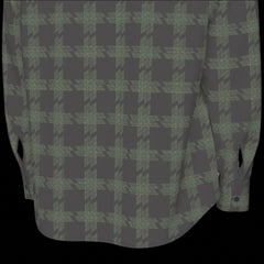 Bottom back of muted colorful plaid shirt on a black background
