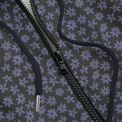 Front detail of black zipper floral patterned hoodie