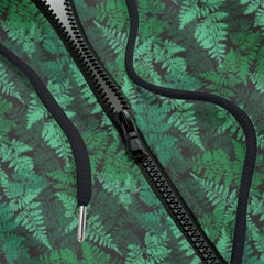 Front detail of a green leafy patterned zipper hoodie