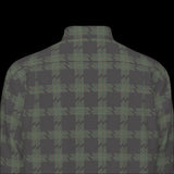 Top back of muted colorful plaid shirt on a black background