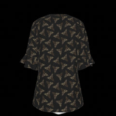 Back of black floral patterned blouse on a black background