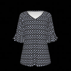 Front of green leaf patterned blouse on a black background