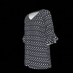 Left of of green leaf patterned blouse on a black background