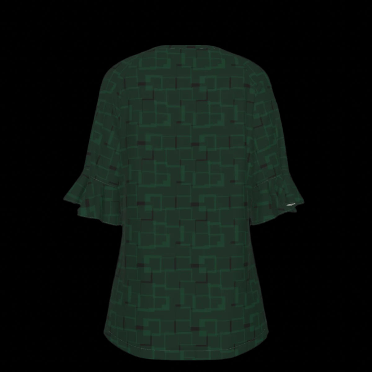 Back of green blouse with geometric pattern on a black background